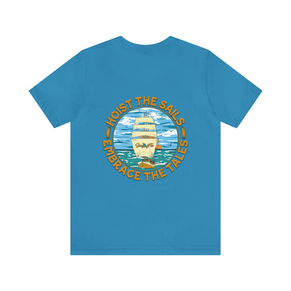 Hoist The Sails Embrace The Tales Unisex Short Sleeve Beach Tee